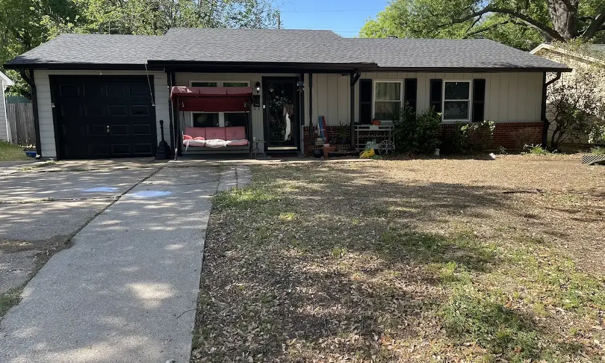 Asphalt Shingle Roof Repair crew at work on a residential roof in Tifton